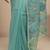 teal ethnic motif beads embellished saree with embellished border and a blouse piece