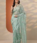 sea green embroidered nylon saree with unstitched blouse piece