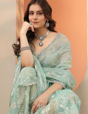 sea green embroidered nylon saree with unstitched blouse piece 4