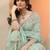 sea green embroidered nylon saree with unstitched blouse piece