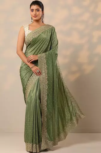 green embellished crepe sarees with unstitched blouse piece