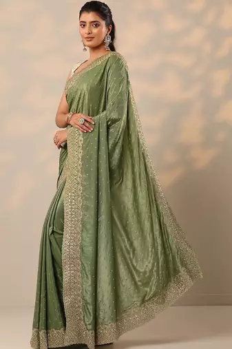 green embellished crepe sarees with unstitched blouse piece