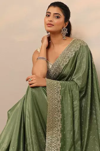 green embellished crepe sarees with unstitched blouse piece