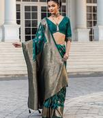 teal woven design saree with unstitched blouse piece