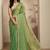 green beads embellished saree with zari embellished saree and a blouse piece