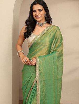 green beads embellished saree with zari embellished saree and a blouse piece 2