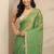 green beads embellished saree with zari embellished saree and a blouse piece