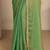 green beads embellished saree with zari embellished saree and a blouse piece
