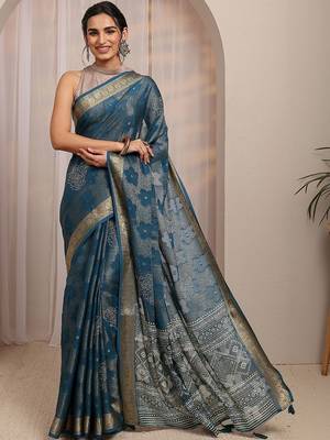 teal floral woven design saree with unstitched blouse piece 1