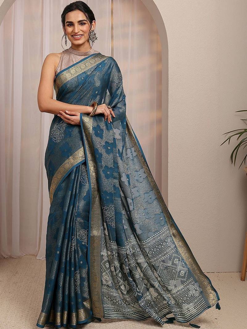 teal floral woven design saree with unstitched blouse piece