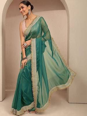 teal solid saree with unstitched blouse piece 1