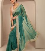 teal solid saree with unstitched blouse piece