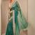 teal solid saree with unstitched blouse piece