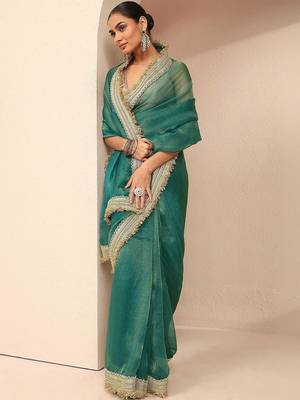 teal solid saree with unstitched blouse piece 4