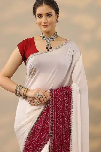 off white embellished crepe saree with unstitched blouse piece