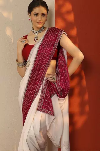off white embellished crepe saree with unstitched blouse piece