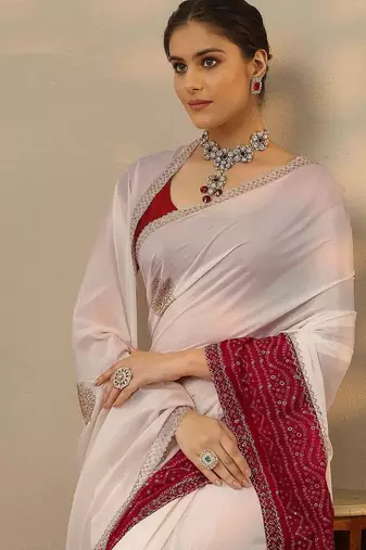 off white embellished crepe saree with unstitched blouse piece