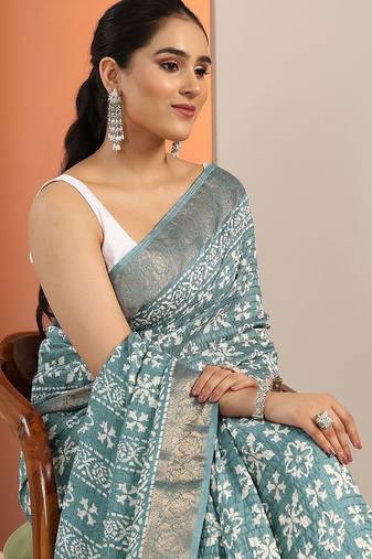 teal printed saree with unstitched blouse piece