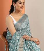 teal printed saree with unstitched blouse piece
