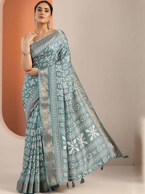 teal printed saree with unstitched blouse piece 2