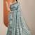 teal printed saree with unstitched blouse piece