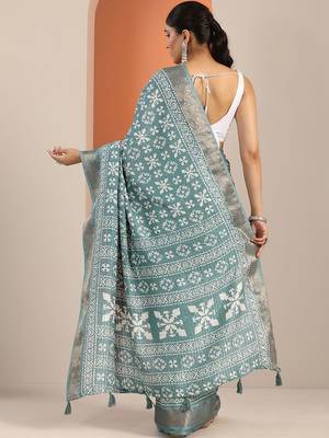 teal printed saree with unstitched blouse piece 4