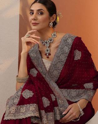 maroon embroidered georgette saree with unstitched blouse piece 5