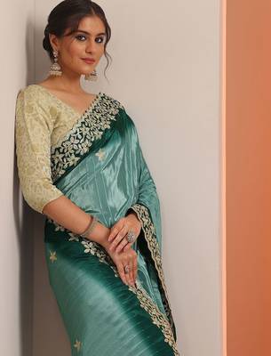 blue embellished crepe saree with unstitched blouse piece 1