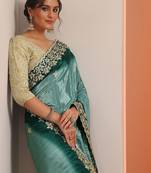 blue embellished crepe saree with unstitched blouse piece