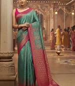 teal woven design banarasi saree with unstitched blouse piece