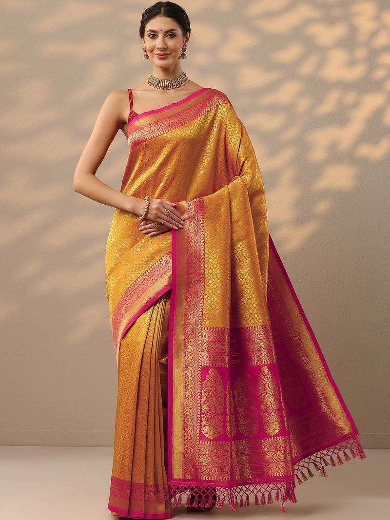 yellow woven design banarasi silk blend saree with unstitched blouse piece