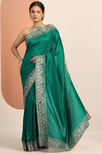 green embellished saree with unstitched blouse piece