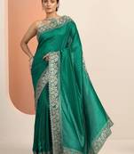 green embellished saree with unstitched blouse piece