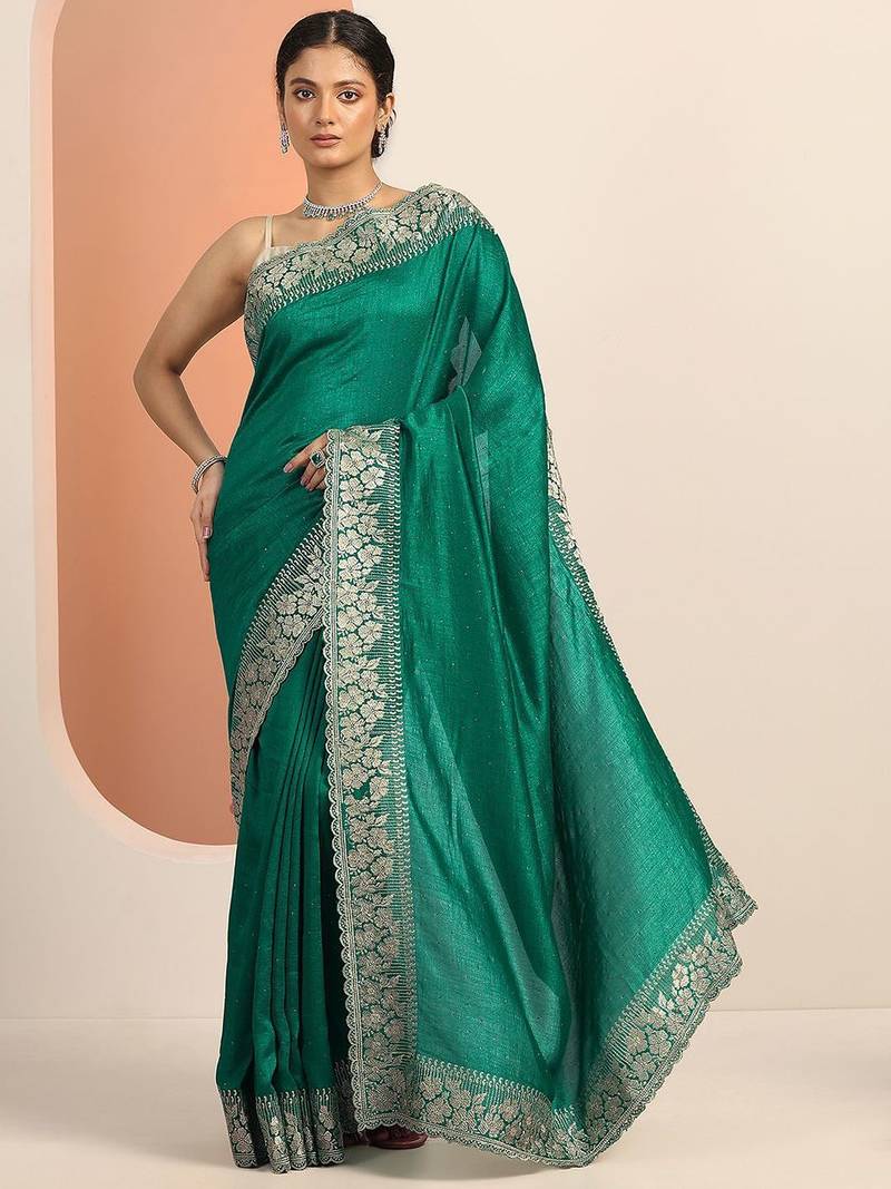 green embellished saree with unstitched blouse piece