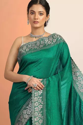green embellished saree with unstitched blouse piece