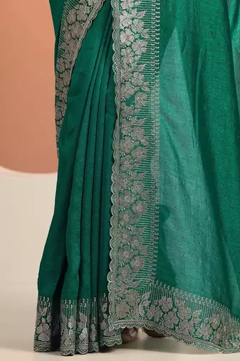 green embellished saree with unstitched blouse piece