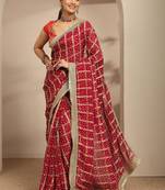 red bandhani printed saree with unstitched blouse piece