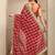 red bandhani printed saree with unstitched blouse piece