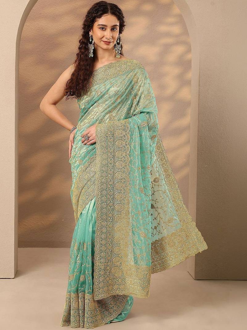 turquoise blue embroidered nylon saree with unstitched blouse piece