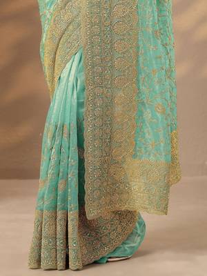 turquoise blue embroidered nylon saree with unstitched blouse piece 2