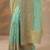 turquoise blue embroidered nylon saree with unstitched blouse piece