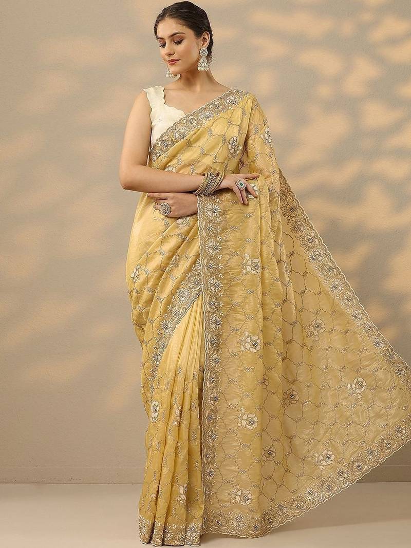 yellow embroidered organza saree with unstitched blouse piece