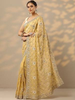 yellow embroidered organza saree with unstitched blouse piece 3