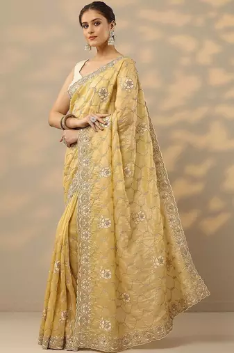yellow embroidered organza saree with unstitched blouse piece