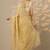 yellow embroidered organza saree with unstitched blouse piece