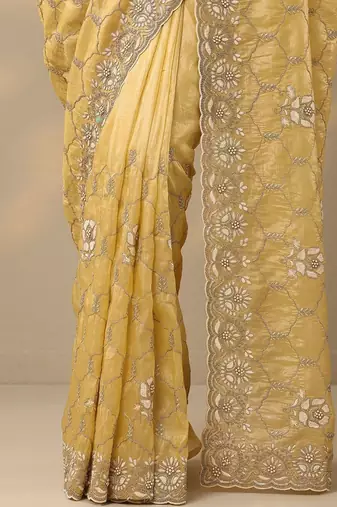 yellow embroidered organza saree with unstitched blouse piece