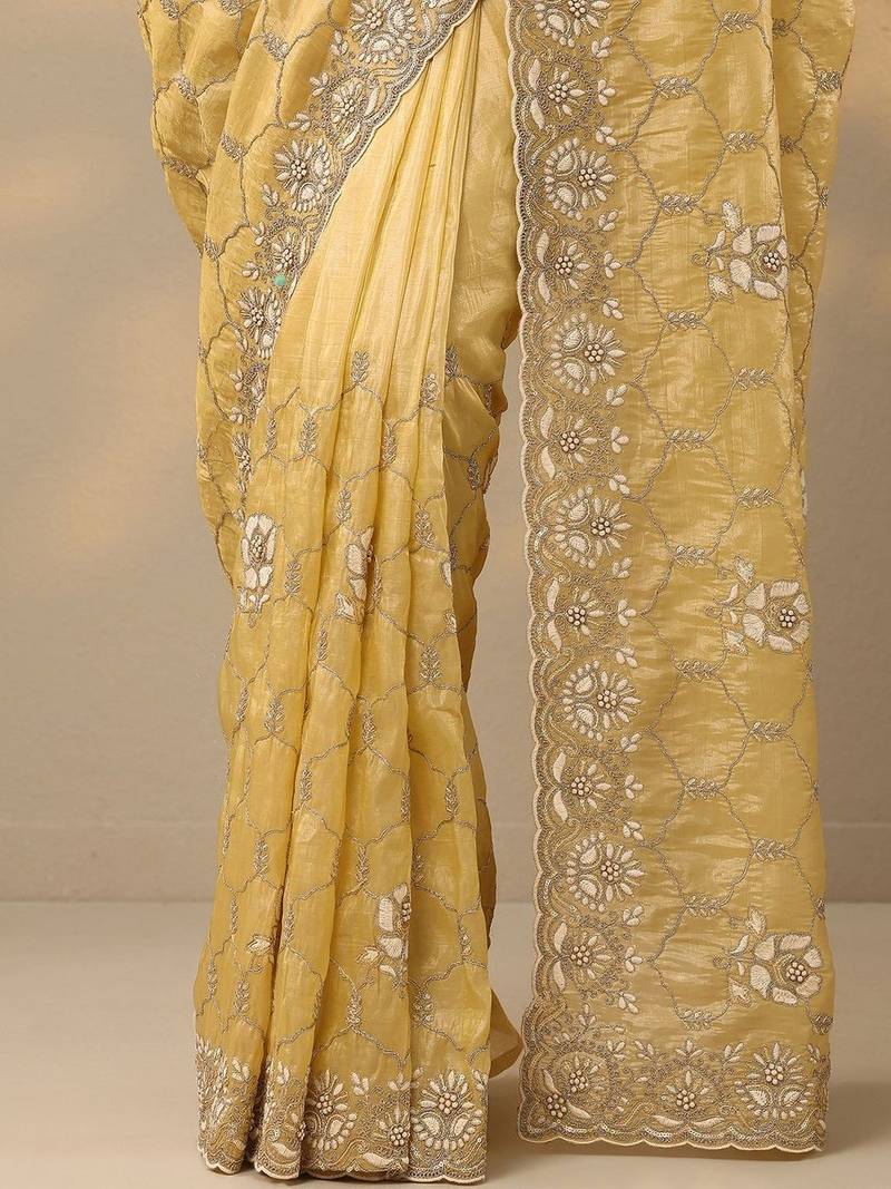 yellow embroidered organza saree with unstitched blouse piece