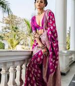 magenta woven design banarasi silk blend saree with unstitched blouse piece