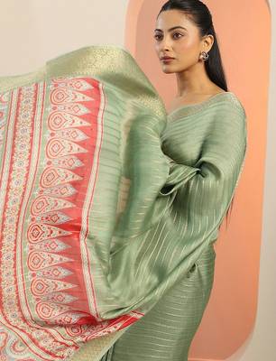 green woven design georgette saree with unstitched blouse piece 1