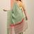 green woven design georgette saree with unstitched blouse piece